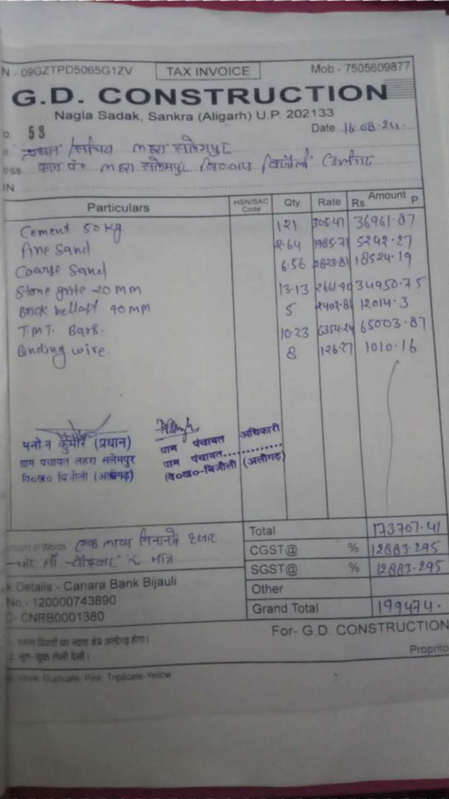 Photograph of a G.D. Construction tax invoice listing construction material and amounts.